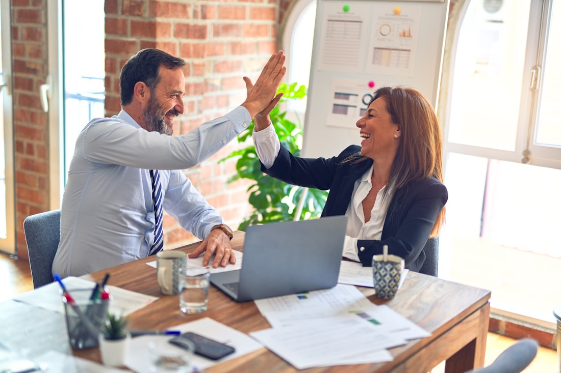 Smart Policy Claim advisors working together in the Austin office