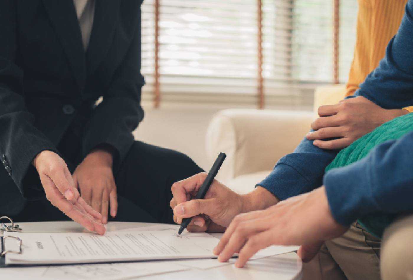 A Smart Policy Claim advisor reviewing insurance options with a young family
